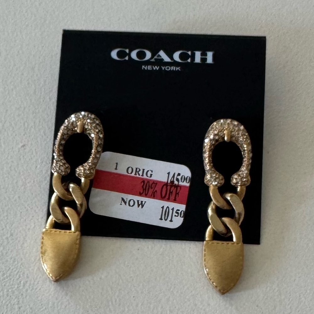 Brand new “COACH”earrings.Beautiful,gold color with white cristals.🤍💛2-inch.long